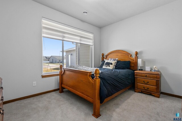 5307 S Dubuque Ave, Sioux Falls, SD 57108 - bedroom with carpet and baseboards