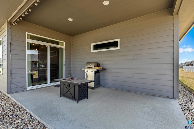 5307 S Dubuque Ave, Sioux Falls, SD 57108 - view of patio / terrace with an outdoor fire pit and area for grilling