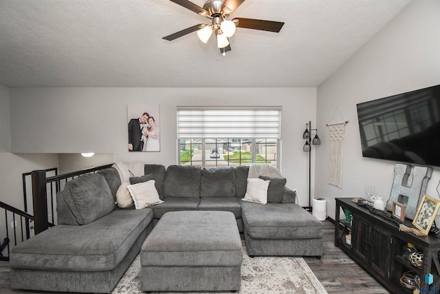 9425 W Liam St, Sioux Falls, SD 57106 - living area with wood finished floors, a ceiling fan, and a textured ceiling