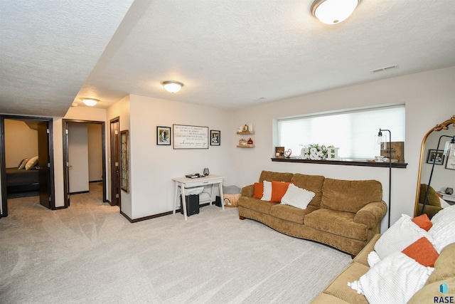 9425 W Liam St, Sioux Falls, SD 57106 - living room with light colored carpet, a textured ceiling, and baseboards