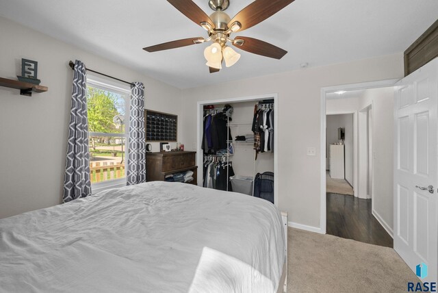 bedroom with carpet floors, a closet, baseboards, and a ceiling fan