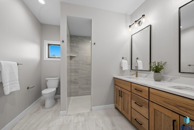 6609 E Corsair Dr, Sioux Falls, SD 57110 - bathroom featuring toilet, a walk in shower, double vanity, and baseboards