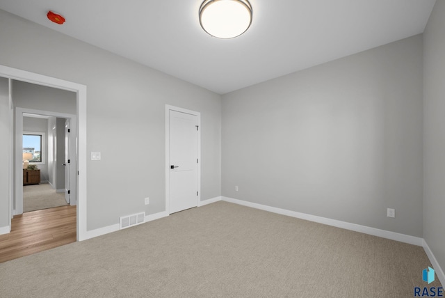 6609 E Corsair Dr, Sioux Falls, SD 57110 - unfurnished bedroom featuring carpet floors and baseboards