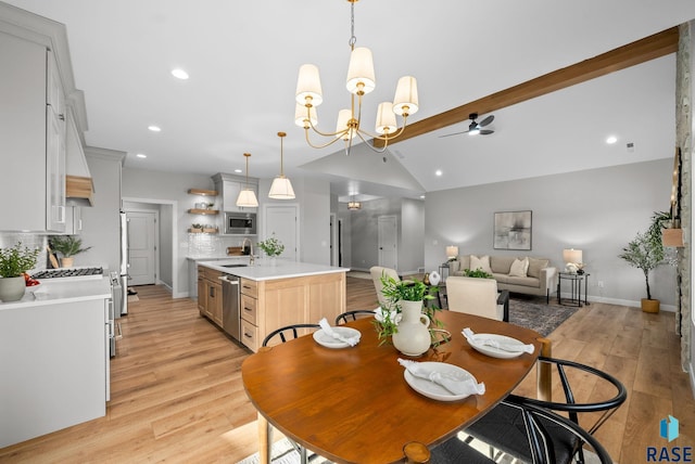 6609 E Corsair Dr, Sioux Falls, SD 57110 - dining room featuring light wood-style flooring, recessed lighting, a chandelier, and baseboards