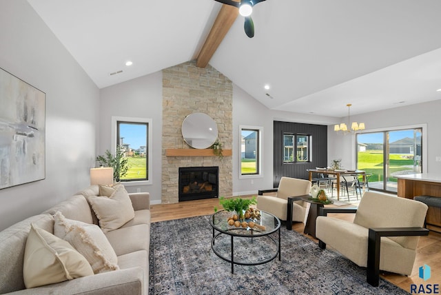 6609 E Corsair Dr, Sioux Falls, SD 57110 - living area featuring wood finished floors, beam ceiling, a chandelier, a fireplace, and recessed lighting