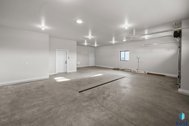 6609 E Corsair Dr, Sioux Falls, SD 57110 - garage featuring baseboards