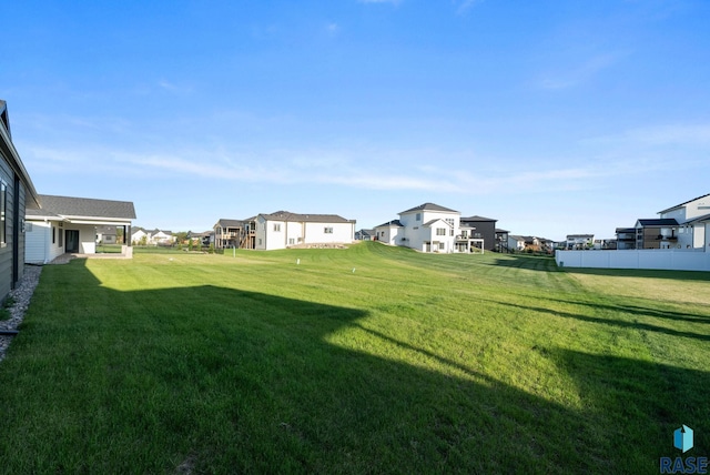 6609 E Corsair Dr, Sioux Falls, SD 57110 - view of green lawn featuring a residential view