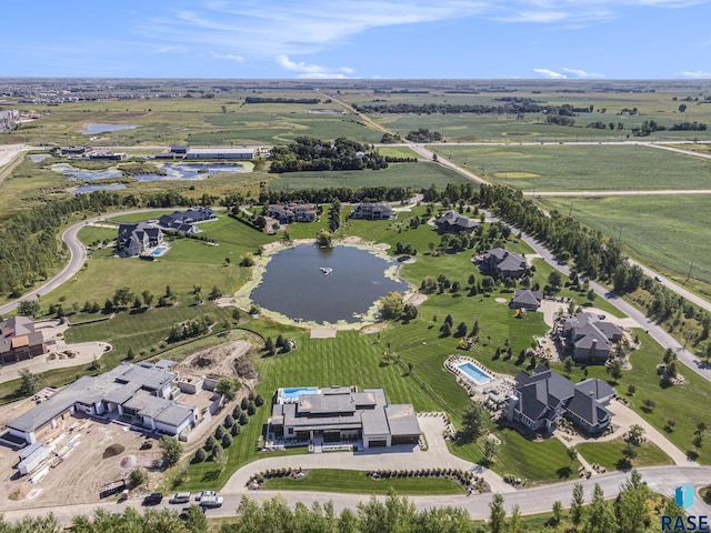 aerial overview of property's location with a large body of water and rural landscape
