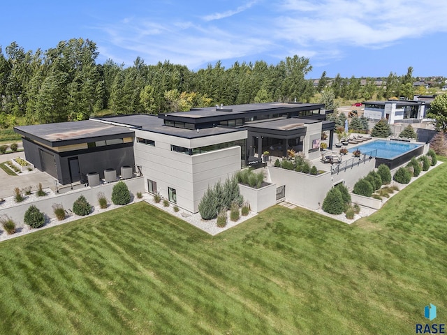 drone / aerial view of a pool area