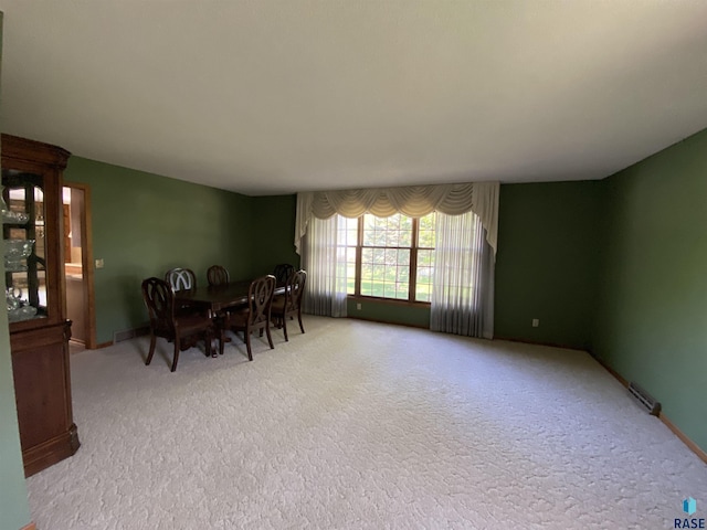 1208 Hampshire Cir, Luverne, MN 56156 - carpeted dining room with baseboards
