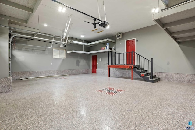 garage featuring a garage door opener