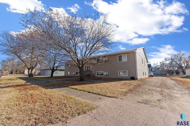301 W Prospect Ave, Flandreau, SD 57028 - view of front of home with dirt driveway