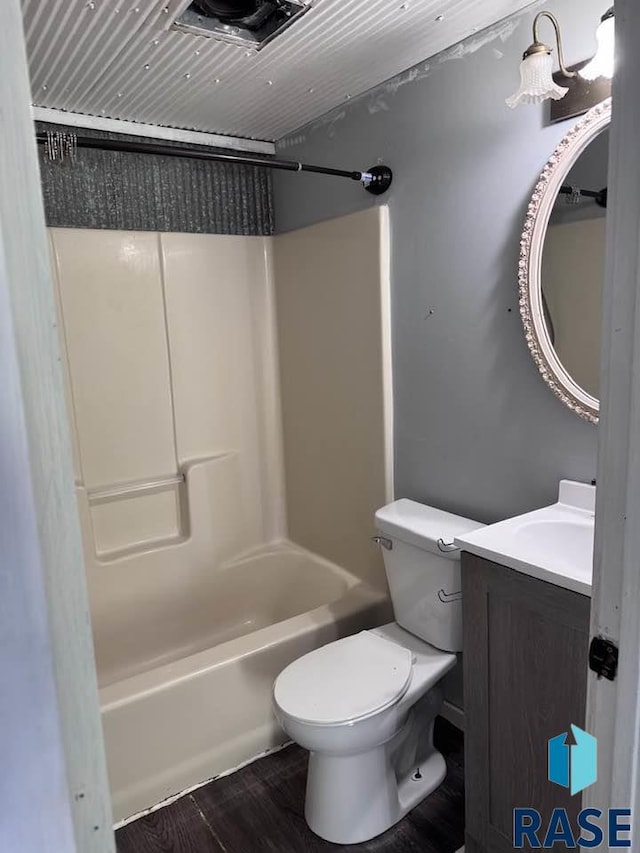 full bathroom with vanity, toilet, and shower / tub combination
