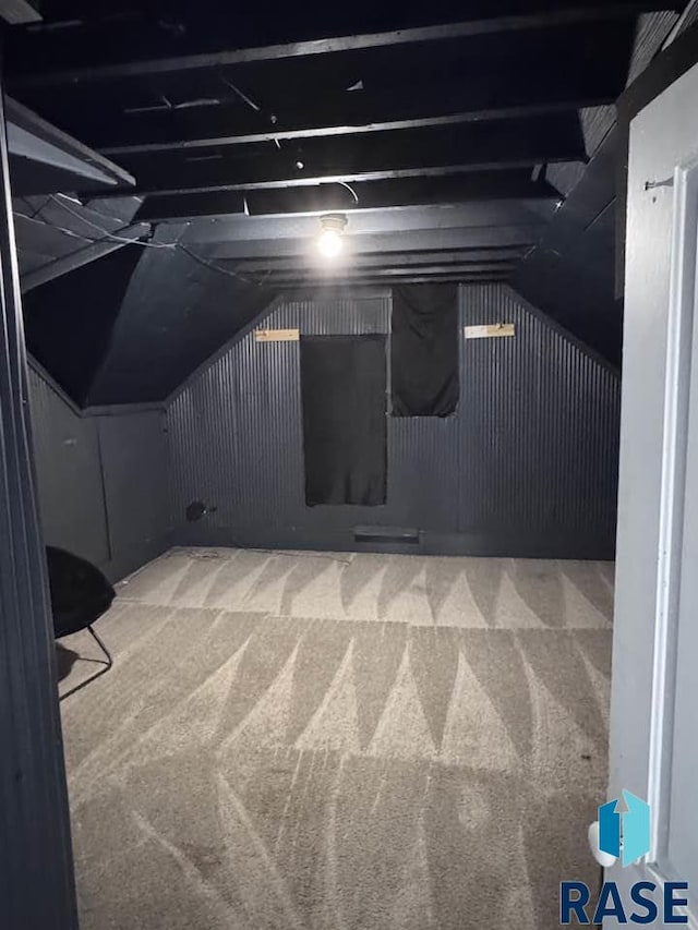 bonus room with carpet and lofted ceiling