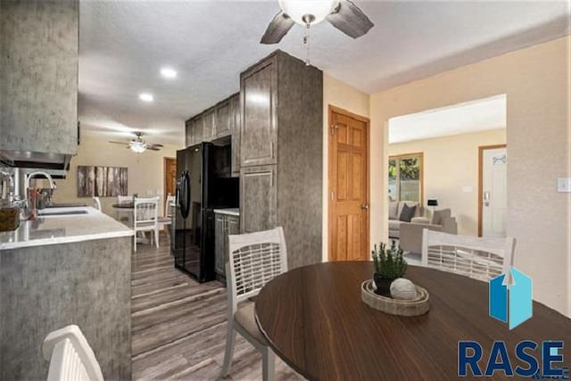 dining area featuring ceiling fan, wood finished floors, and recessed lighting
