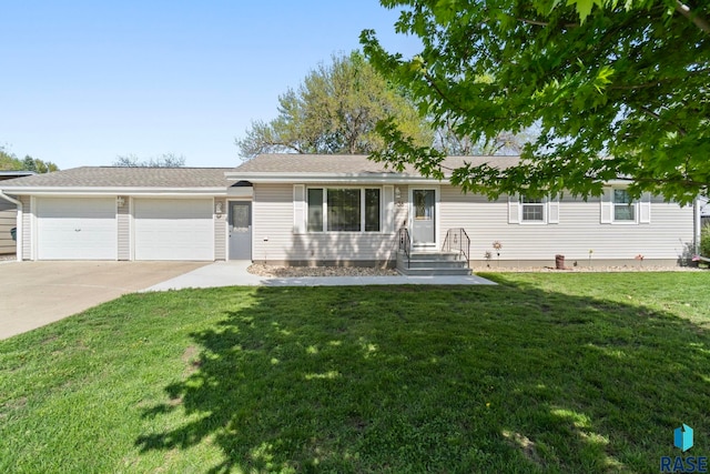 single story home with driveway, a garage, and a front yard