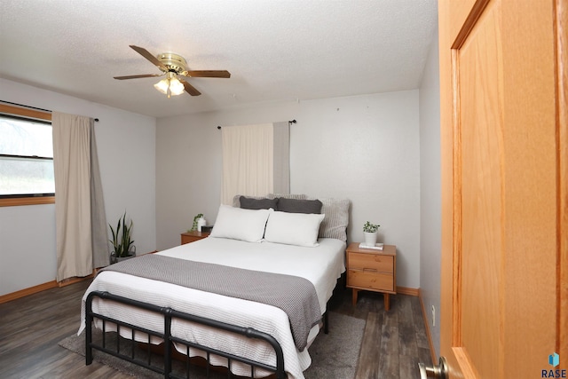 47743 233a St, Egan, SD 57024 - bedroom with wood finished floors, baseboards, ceiling fan, and a textured ceiling