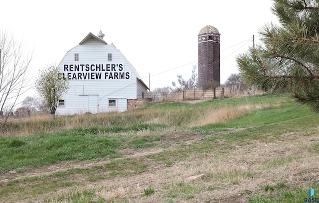 47743 233a St, Egan, SD 57024 - view of home's exterior featuring a barn, fence, and an outbuilding
