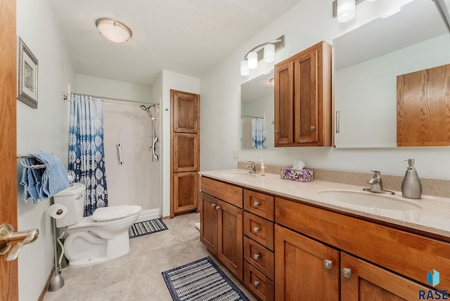 bathroom with double vanity, toilet, and a shower with shower curtain