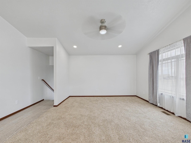 1180 Ruud Trl, Hartford, SD 57033 - carpeted spare room featuring ceiling fan, baseboards, and recessed lighting