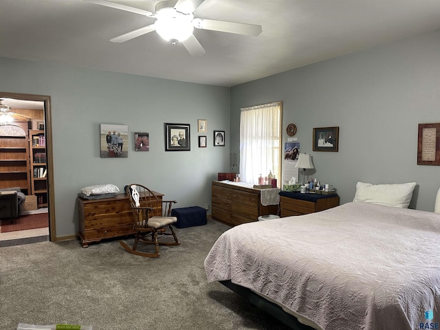 carpeted bedroom with a ceiling fan