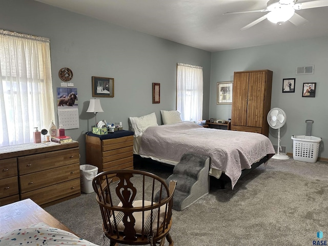 carpeted bedroom featuring a ceiling fan