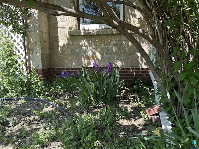 view of home's exterior with brick siding