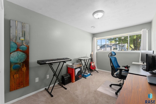 office area featuring carpet floors and baseboards