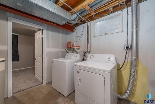 laundry area with independent washer and dryer