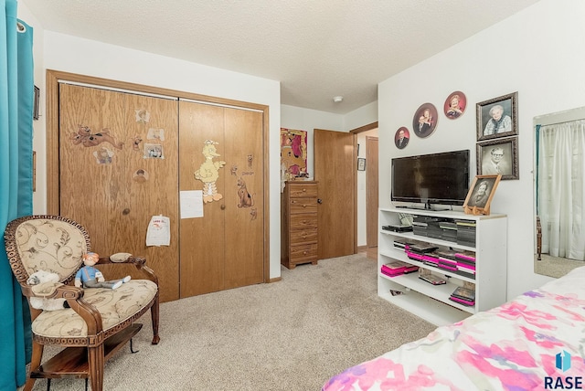 carpeted bedroom featuring a closet