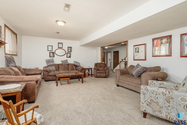 living area featuring carpet flooring