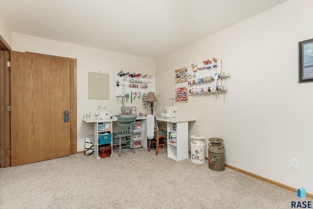 office space with carpet flooring and baseboards
