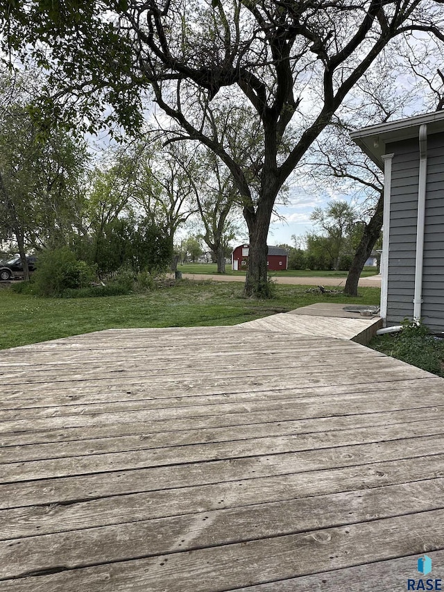 531 N Adams St, Salem, SD 57058 - deck featuring a yard