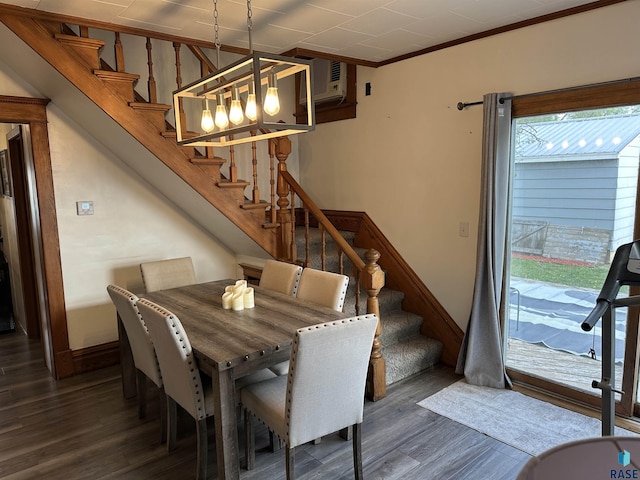 531 N Adams St, Salem, SD 57058 - dining room with wood finished floors, stairway, and ornamental molding