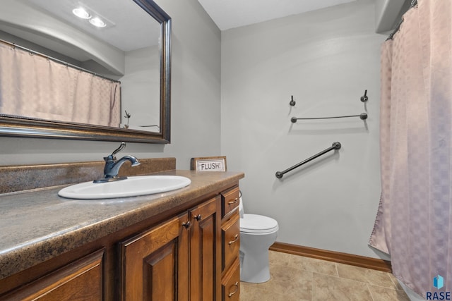 2300 Carson Cir, Tea, SD 57064 - bathroom with vanity, toilet, and baseboards
