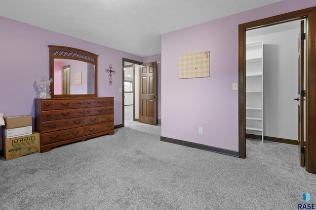 2300 Carson Cir, Tea, SD 57064 - bedroom featuring carpet floors, baseboards, and a spacious closet