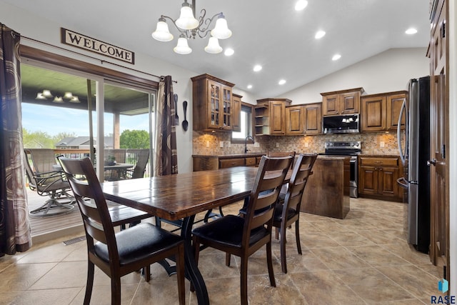 2300 Carson Cir, Tea, SD 57064 - dining area featuring lofted ceiling, a chandelier, and recessed lighting