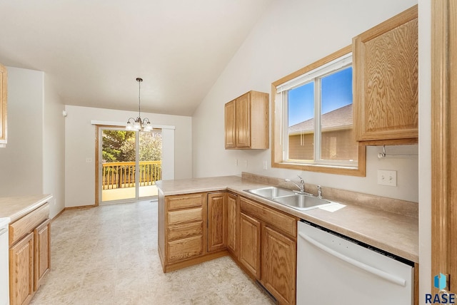2604 N Wright Ave, Sioux Falls, SD 57107 - kitchen featuring white dishwasher, lofted ceiling, a sink, a chandelier, and light countertops