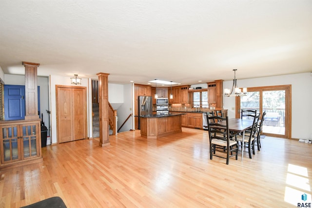 4600 S Harrington Ave, Sioux Falls, SD 57103 - dining area with light wood-style flooring, a chandelier, and recessed lighting