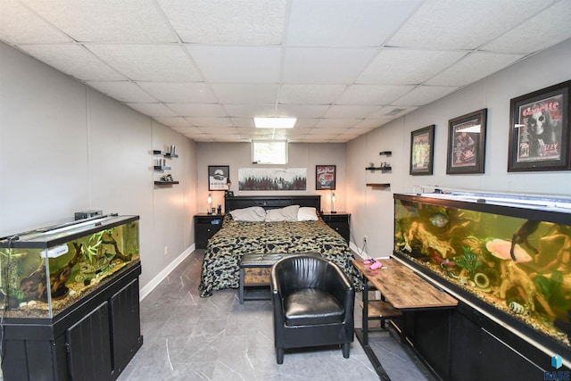 4600 S Harrington Ave, Sioux Falls, SD 57103 - bedroom with a paneled ceiling, marble finish floors, and baseboards