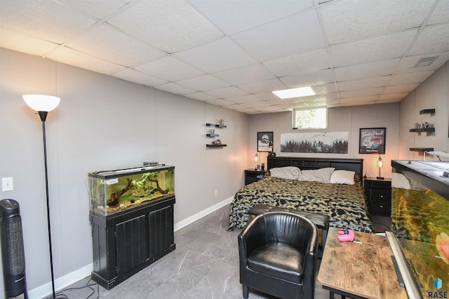 4600 S Harrington Ave, Sioux Falls, SD 57103 - bedroom featuring a drop ceiling, baseboards, and marble finish floors