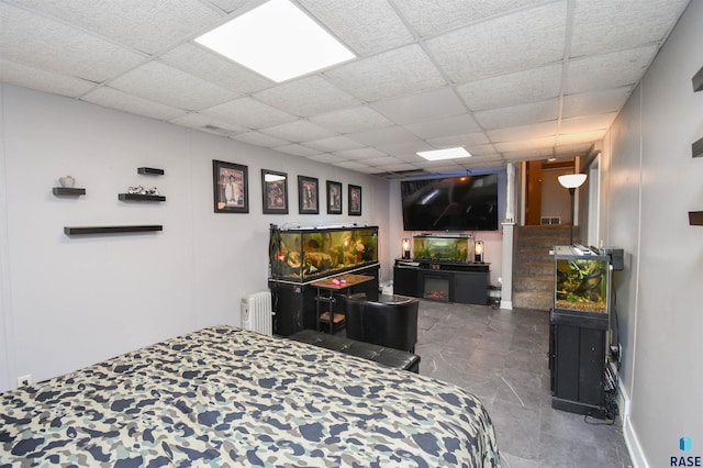 4600 S Harrington Ave, Sioux Falls, SD 57103 - bedroom with radiator and a drop ceiling