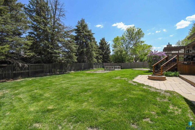 4600 S Harrington Ave, Sioux Falls, SD 57103 - view of yard with a patio, stairway, and a wooden deck