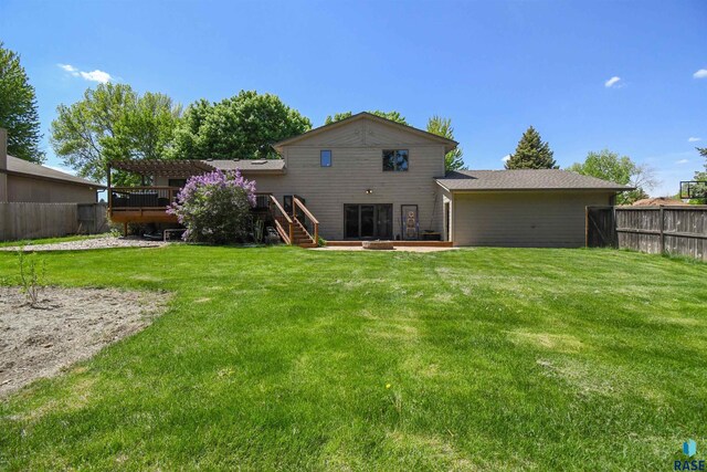 4600 S Harrington Ave, Sioux Falls, SD 57103 - back of property with a pergola, stairs, and a wooden deck