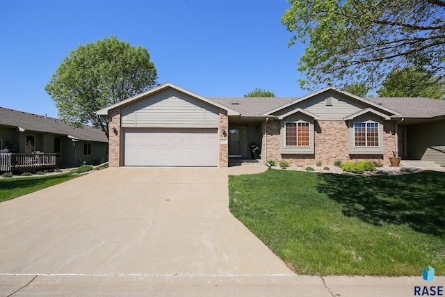 5223 E Pop Fly Pl, Sioux Falls, SD 57110 - single story home with a garage, concrete driveway, brick siding, and a front lawn