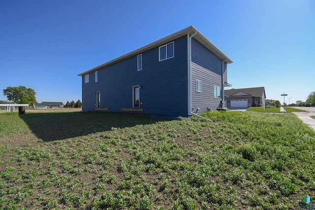 3900 S Caballo Ct, Sioux Falls, SD 57106 - view of side of property with a garage