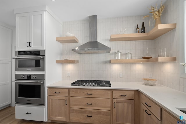 2009 S Firestone Ln, Sioux Falls, SD 57110 - kitchen with open shelves, wall chimney range hood, appliances with stainless steel finishes, and decorative backsplash
