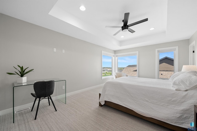 2009 S Firestone Ln, Sioux Falls, SD 57110 - carpeted bedroom featuring a tray ceiling, baseboards, recessed lighting, and ceiling fan