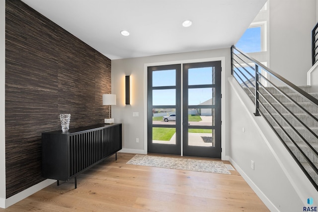 2009 S Firestone Ln, Sioux Falls, SD 57110 - doorway to outside featuring plenty of natural light, recessed lighting, light wood-style flooring, and baseboards