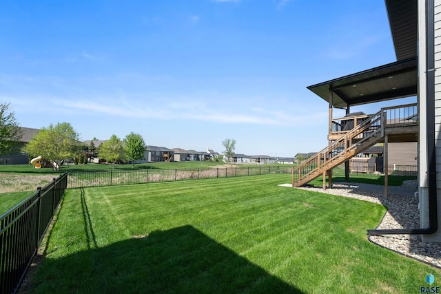 2009 S Firestone Ln, Sioux Falls, SD 57110 - view of yard featuring stairway and a wooden deck